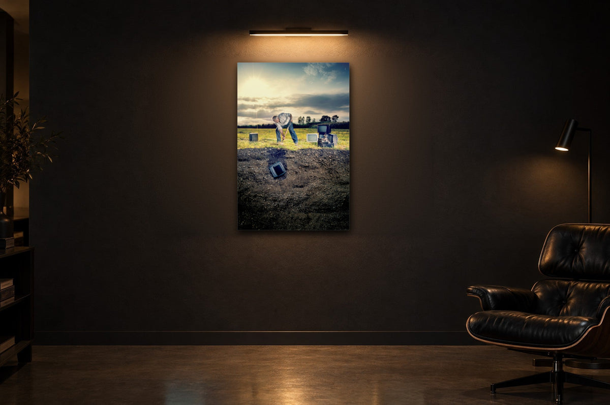 Television Project No. 01 — Burial — photo print shown in a dark gallery room under a picture light